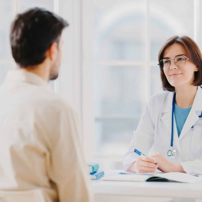 Doctor talking with patient